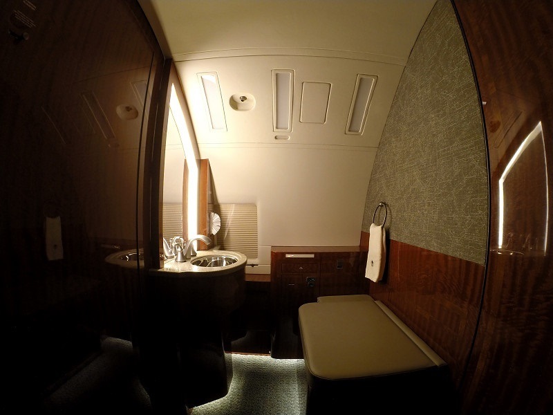 Private jet lavatory and vanity on an accessible charter aircraft from Boca Raton, Florida